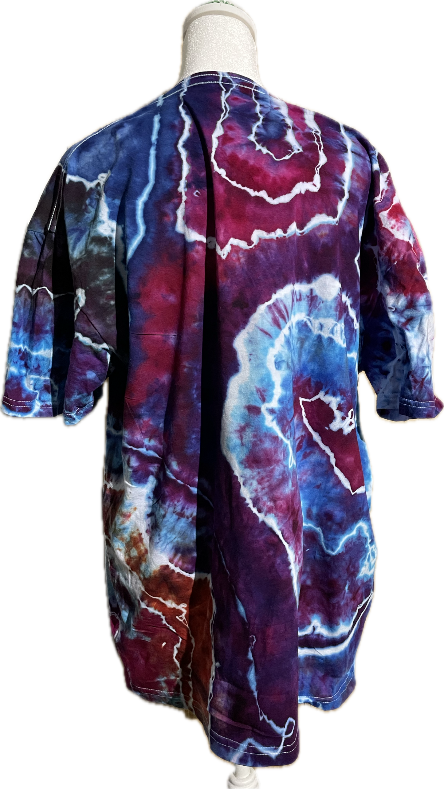 Purple, pink, and blue short sleeve ice tie dye geode in the size XL